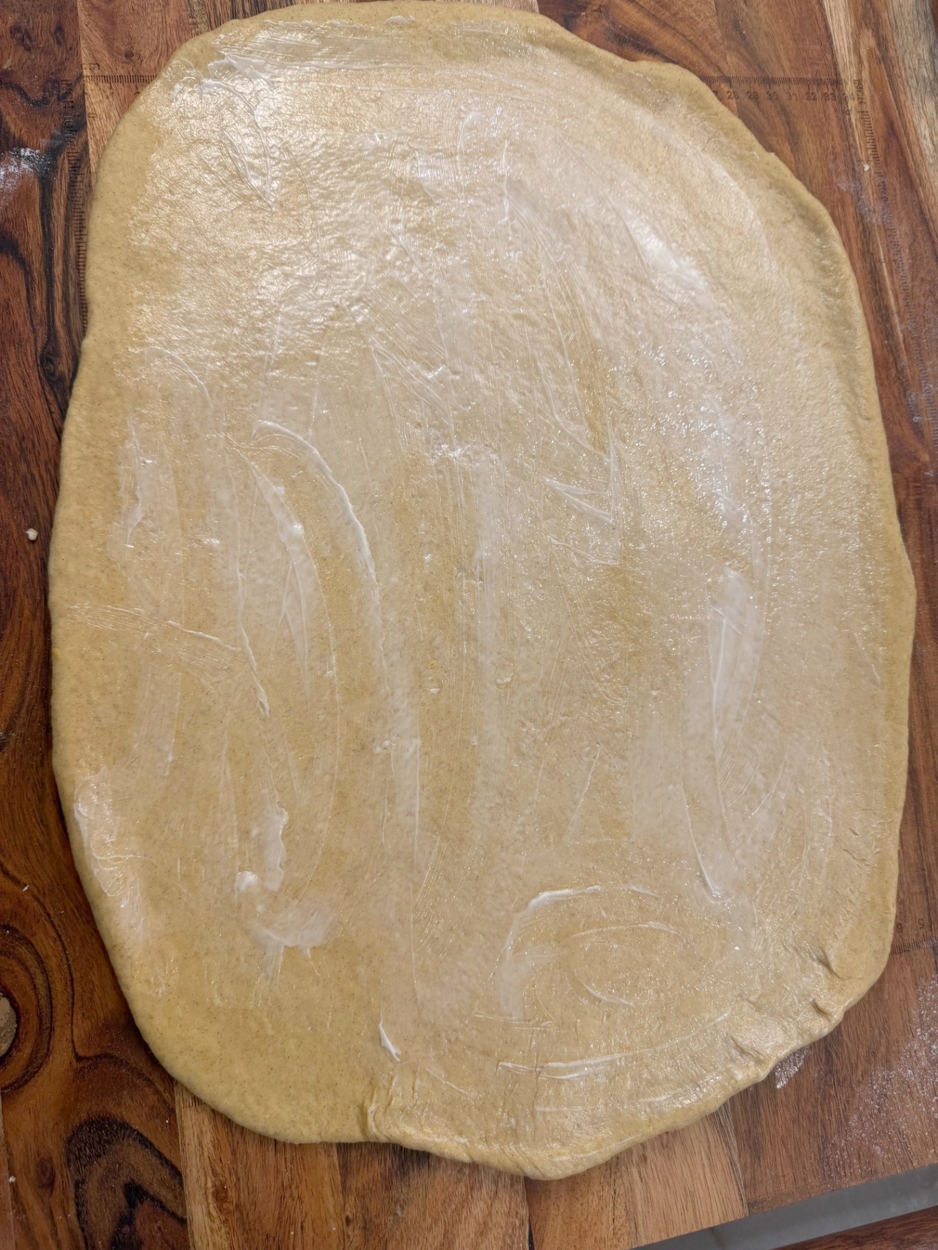 Butter spread over the dough rectangle
