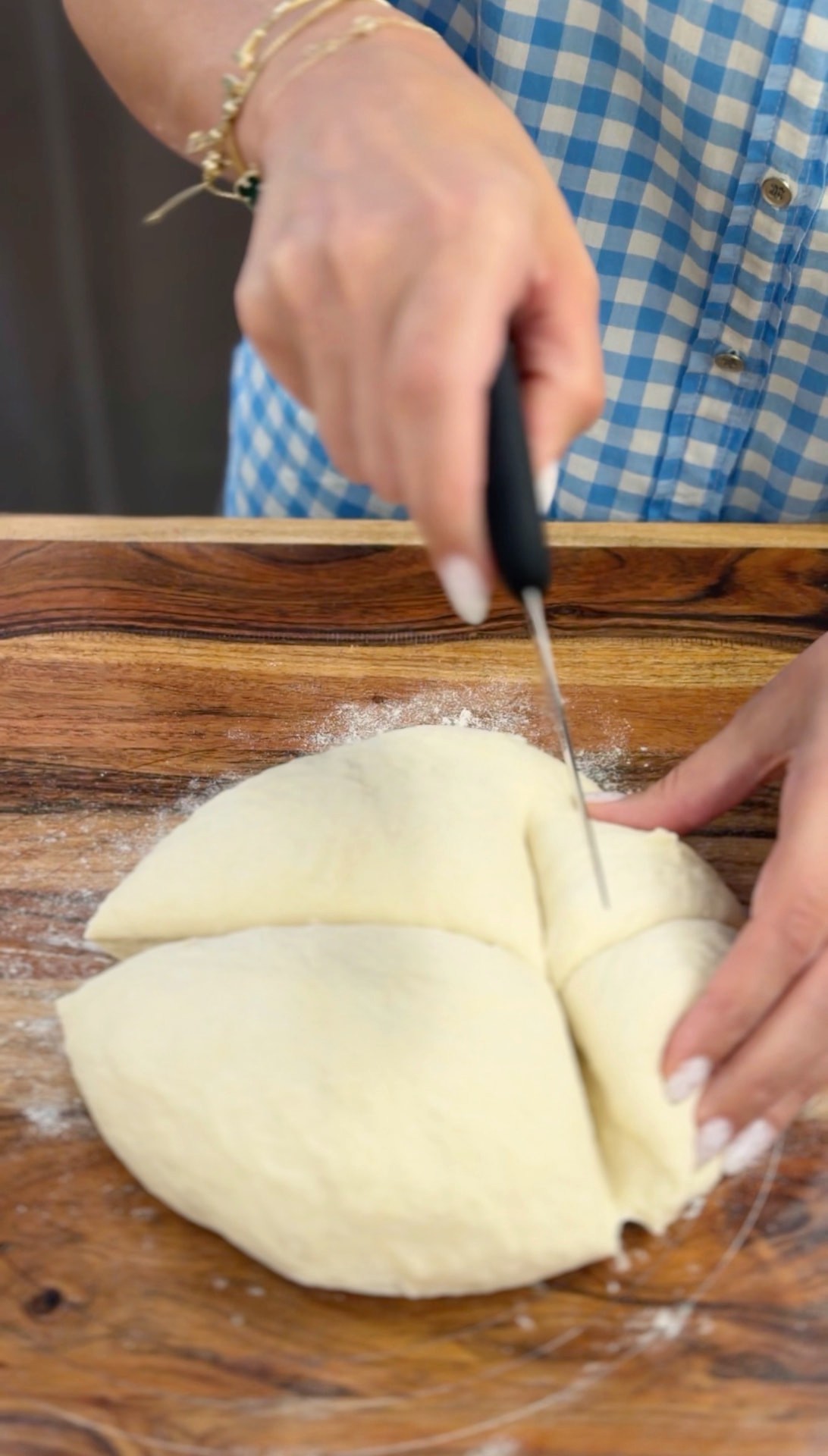 Cutting the kneaded dough into portions with a knife